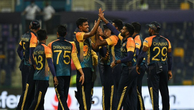 Sri Lankan players celebrate after taking a wicket.