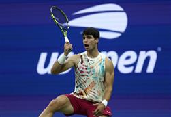Alcaraz and Medvedev move on at US Open as Isner exits with a bang